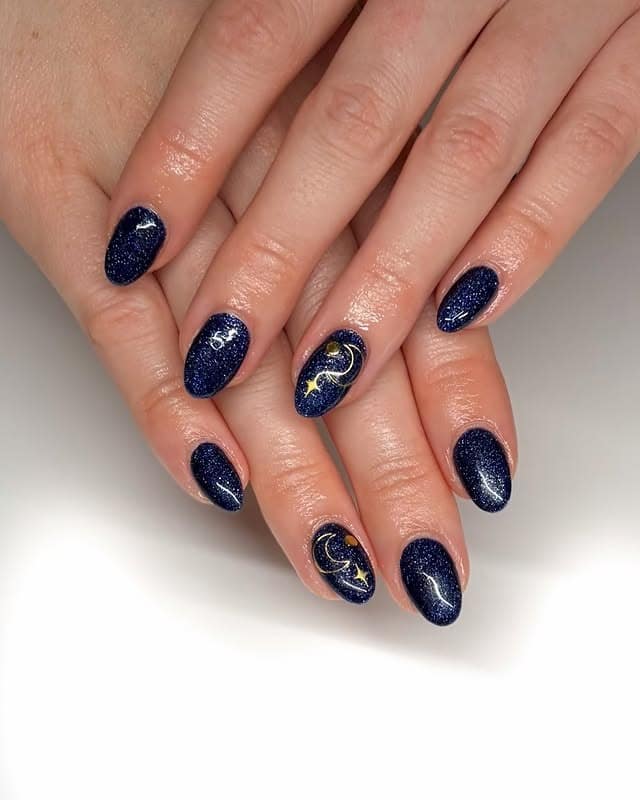 20. Navy Galaxy Moon and Star Nails - navy and gold nail ideas