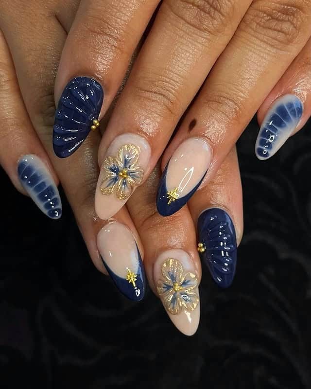 21. Navy Blue 3D Floral Almond Nails - navy and gold nail ideas
