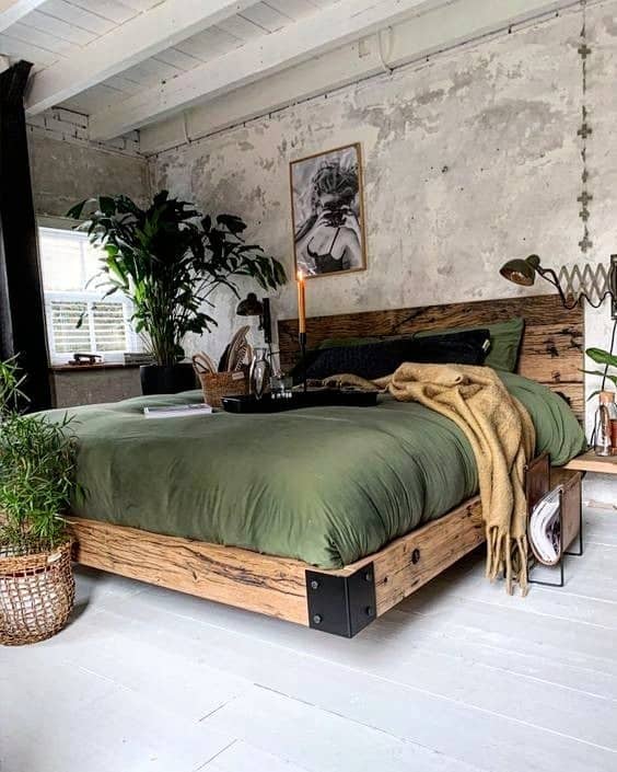 18. Raw Industrial Bedroom with Weathered Wood and Sage Green - industrial bedroom ideas