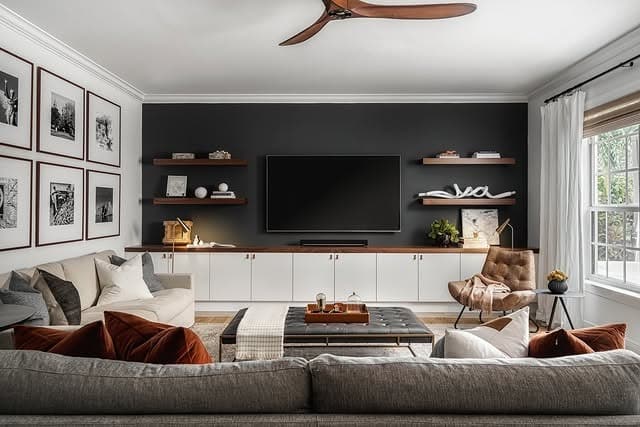 5. Black Accent Wall Living Room with Warm Neutrals - moody living room ideas