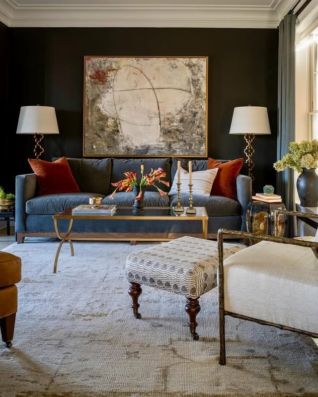10. Moody Glam Living Room with Black Walls and Gold Details - moody living room ideas