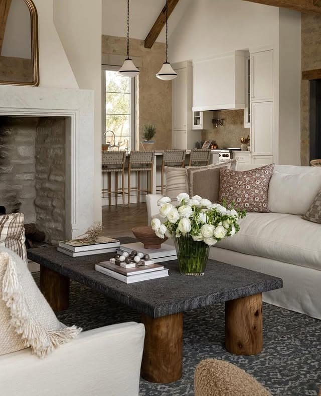 11. Soft Beige Moody Living Room with Rustic Stone Fireplace - moody living room ideas