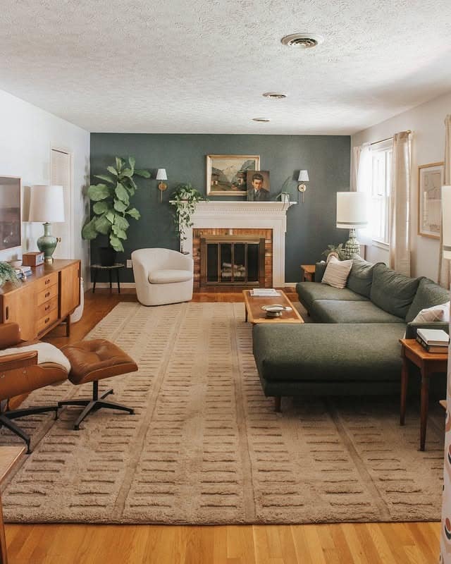 12. Forest Green Moody Living Room with Mid-Century Style - moody living room ideas