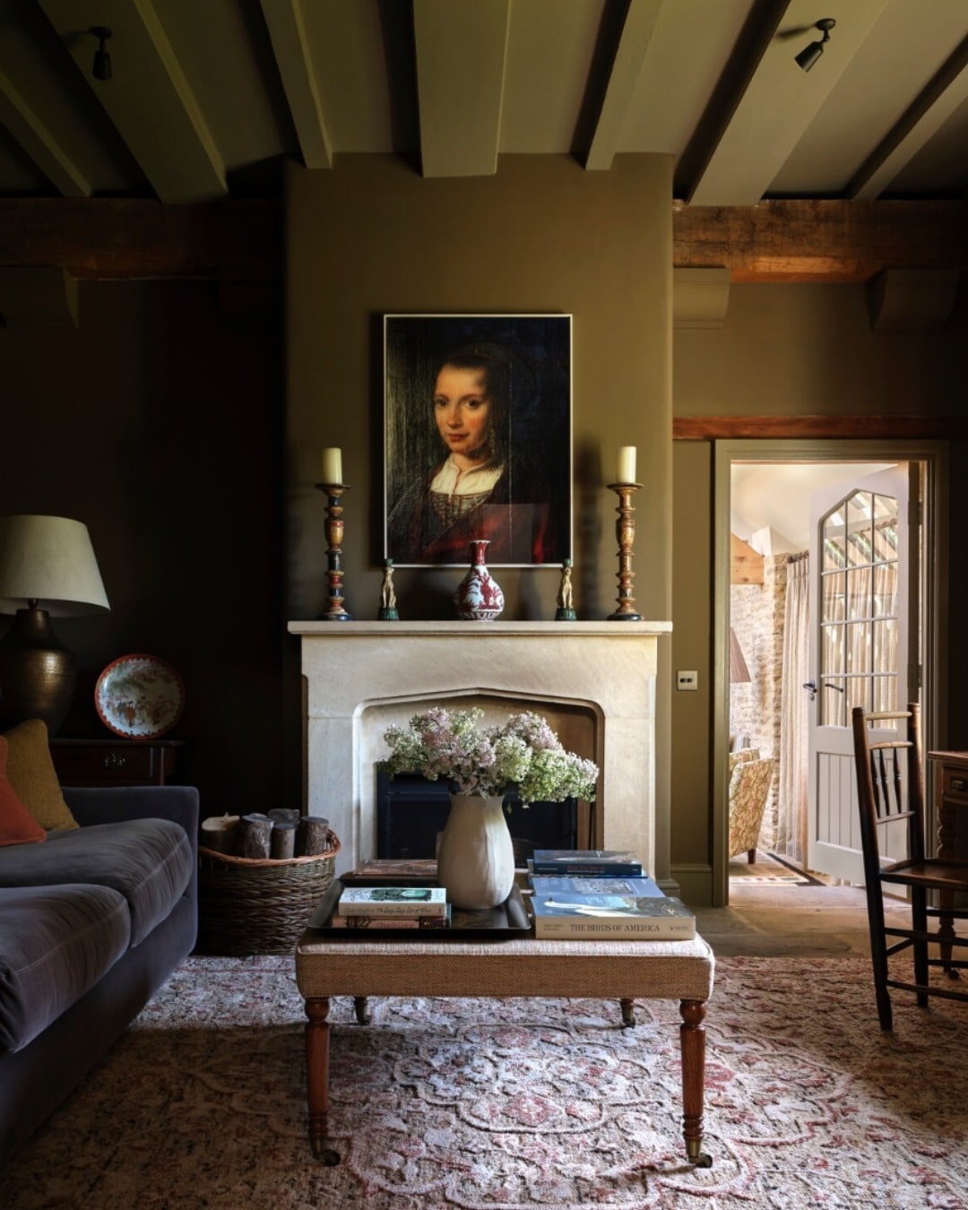 13. Olive Brown Moody Living Room with Vintage Charm - moody living room ideas