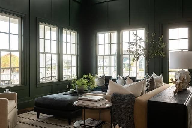 16. Deep Green Moody Living Room with Oversized Windows - moody living room ideas