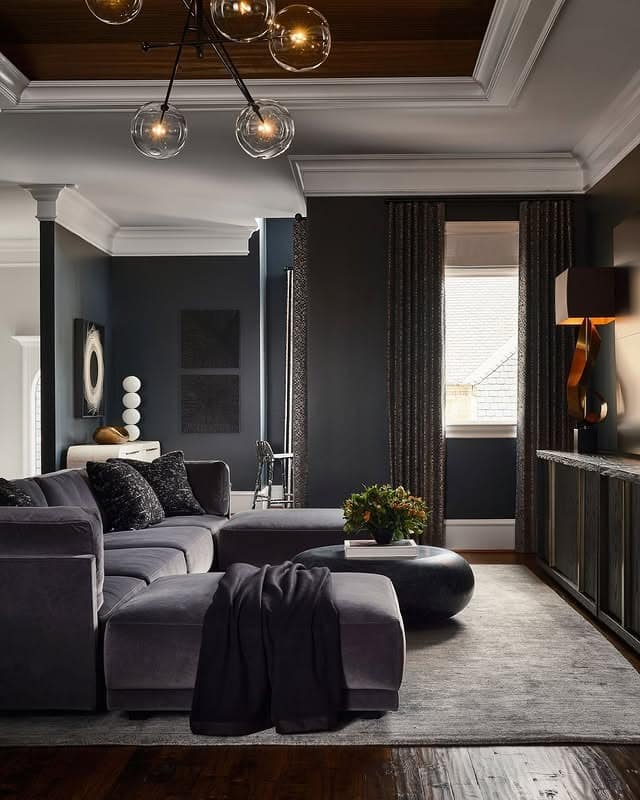 21. Charcoal Black Moody Living Room with Velvet Seating - moody living room ideas
