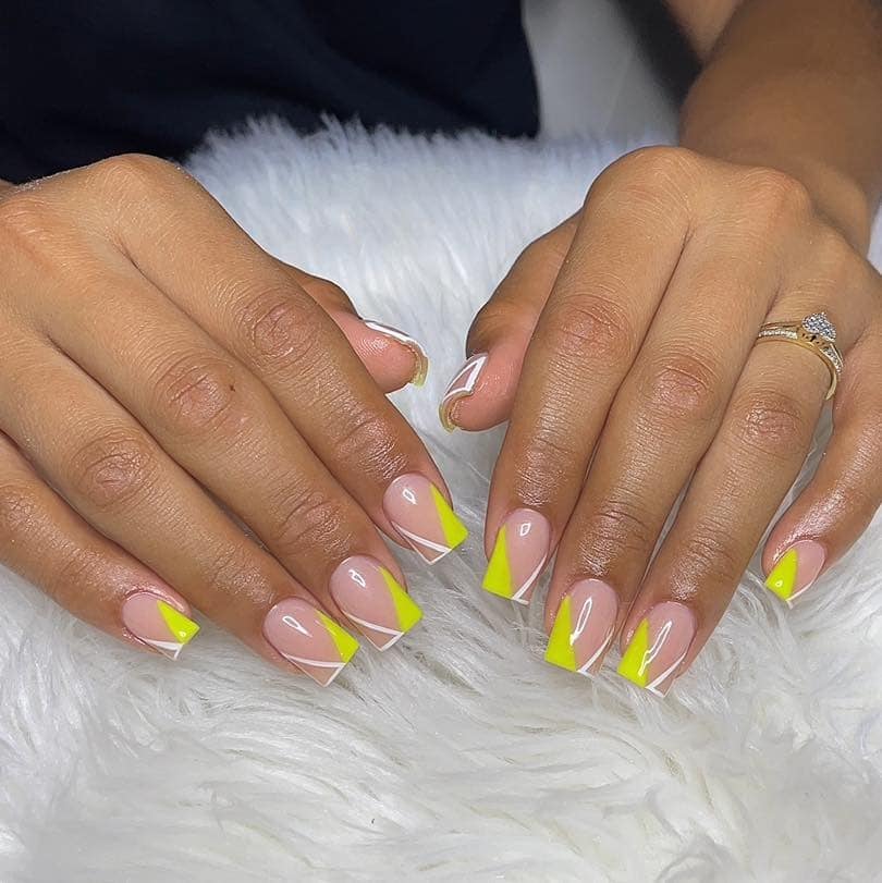 2. Neon Yellow Geometric French Tip Nails - yellow and white nail ideas