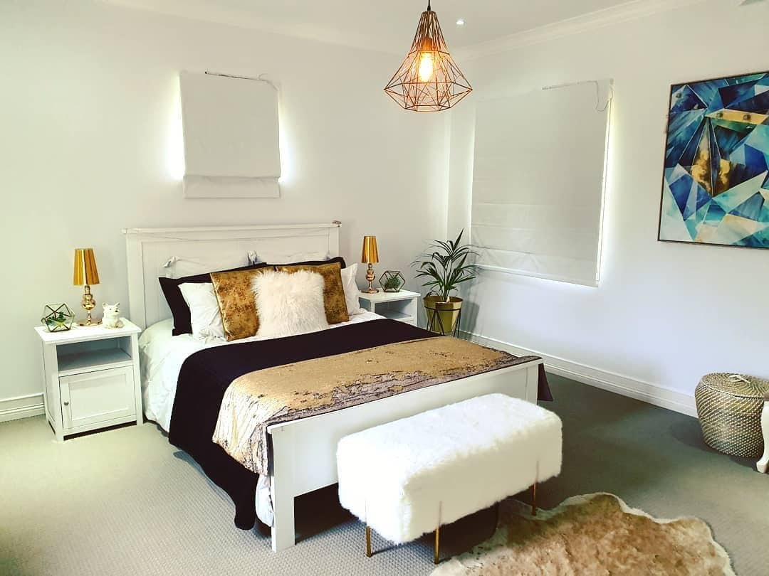 12. White, Black, and Gold Modern Bedroom - white and gold bedroom ideas