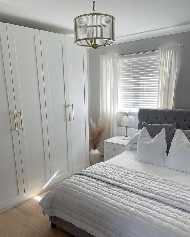 13. Soft Gray and White Bedroom with Gold Hardware - white and gold bedroom ideas