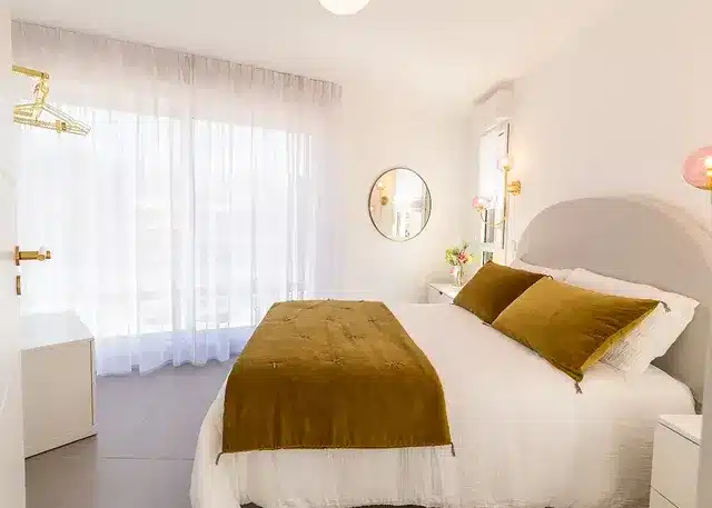 14. White and Mustard Gold Minimal Bedroom - white and gold bedroom ideas