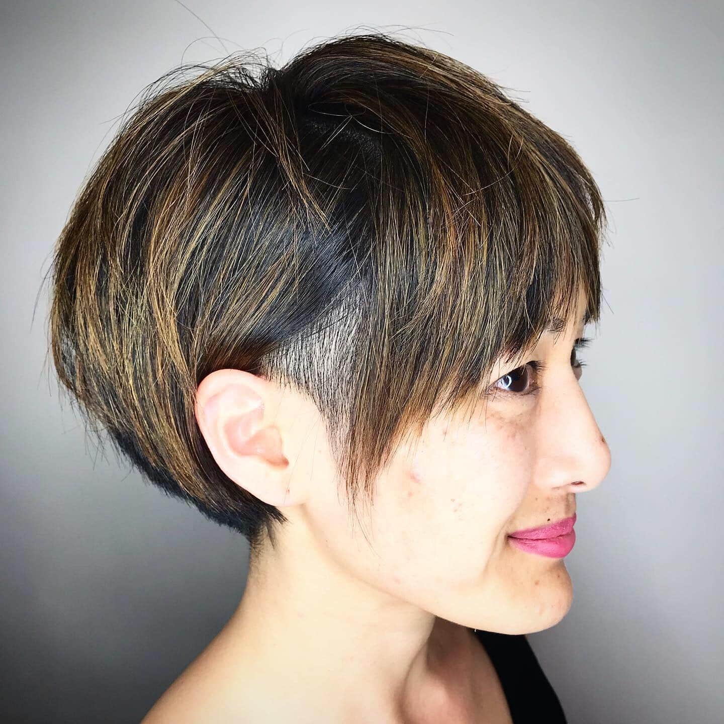 2. Textured Espresso Pixie Undercut with Caramel Highlights - Long Pixie Haircuts