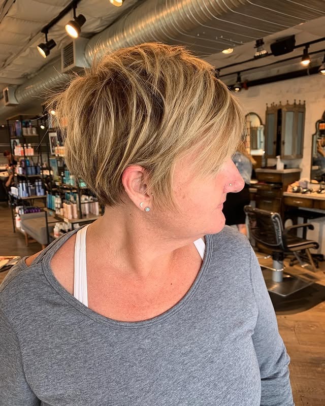 15. Feathered Honey Blonde Long Pixie - Long Pixie Haircuts