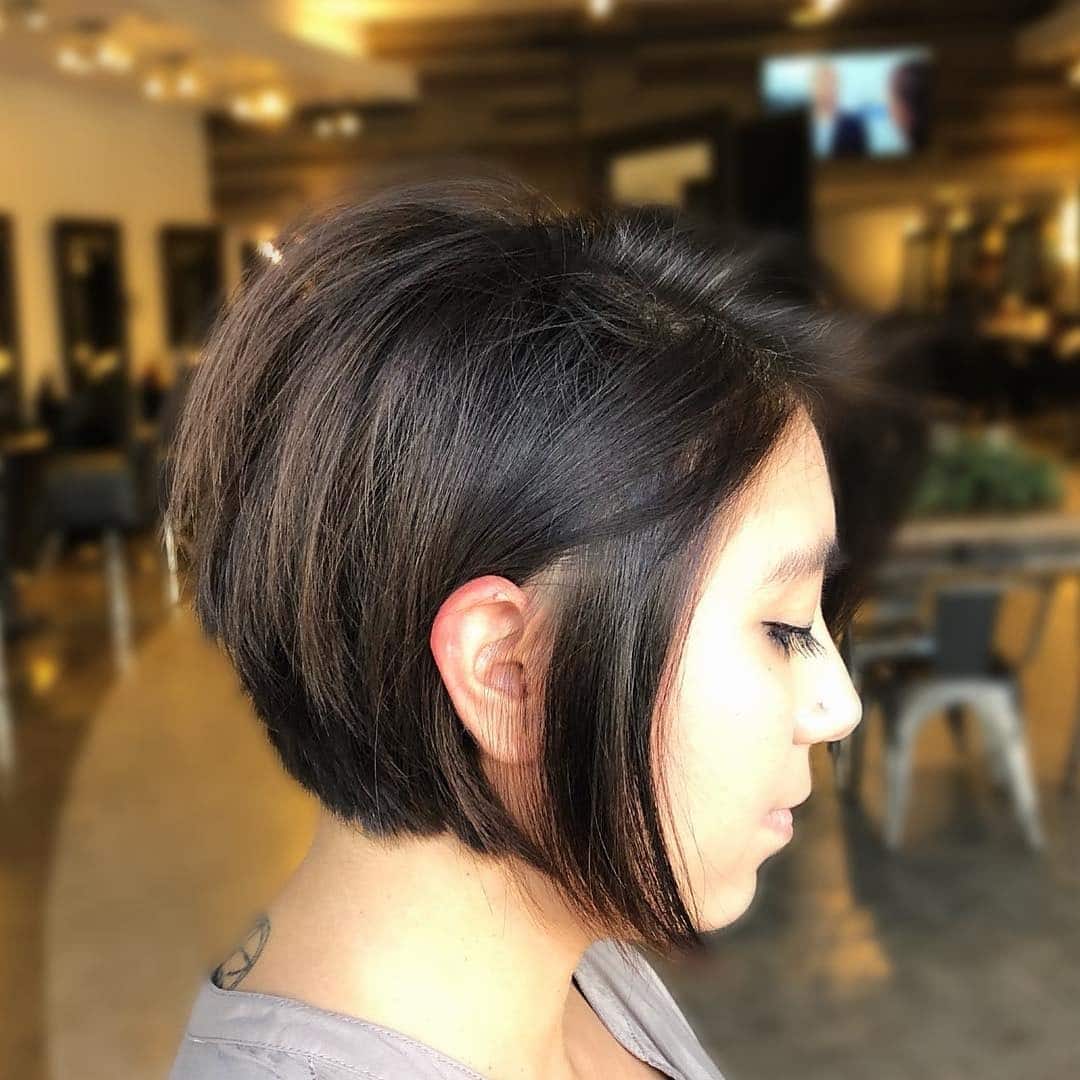 18. Glossy Black Asymmetrical Long Pixie - Long Pixie Haircuts