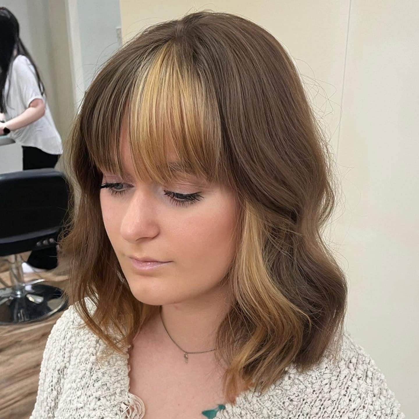 17. Face-Framing Blonde Money Piece Lob - Shoulder Length Lob