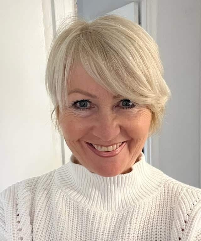 3. Layered Side-Swept Bob in Silver Blonde - Short Layered Wispy Haircuts