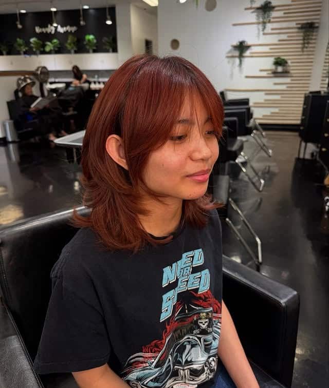 9. Shaggy Layered Wolf Bob in Copper Red - Short Layered Wispy Haircuts