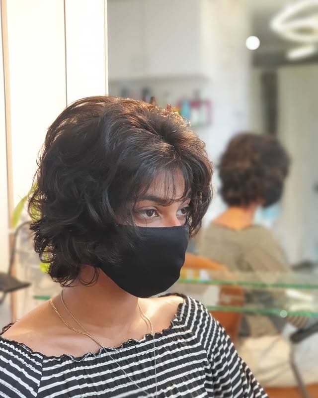 11. Feathered Layered Bob in Soft Black - Short Layered Wispy Haircuts