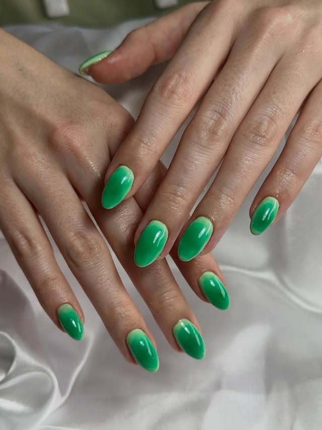 3. Glossy Emerald Green Almond Nails - green nail ideas