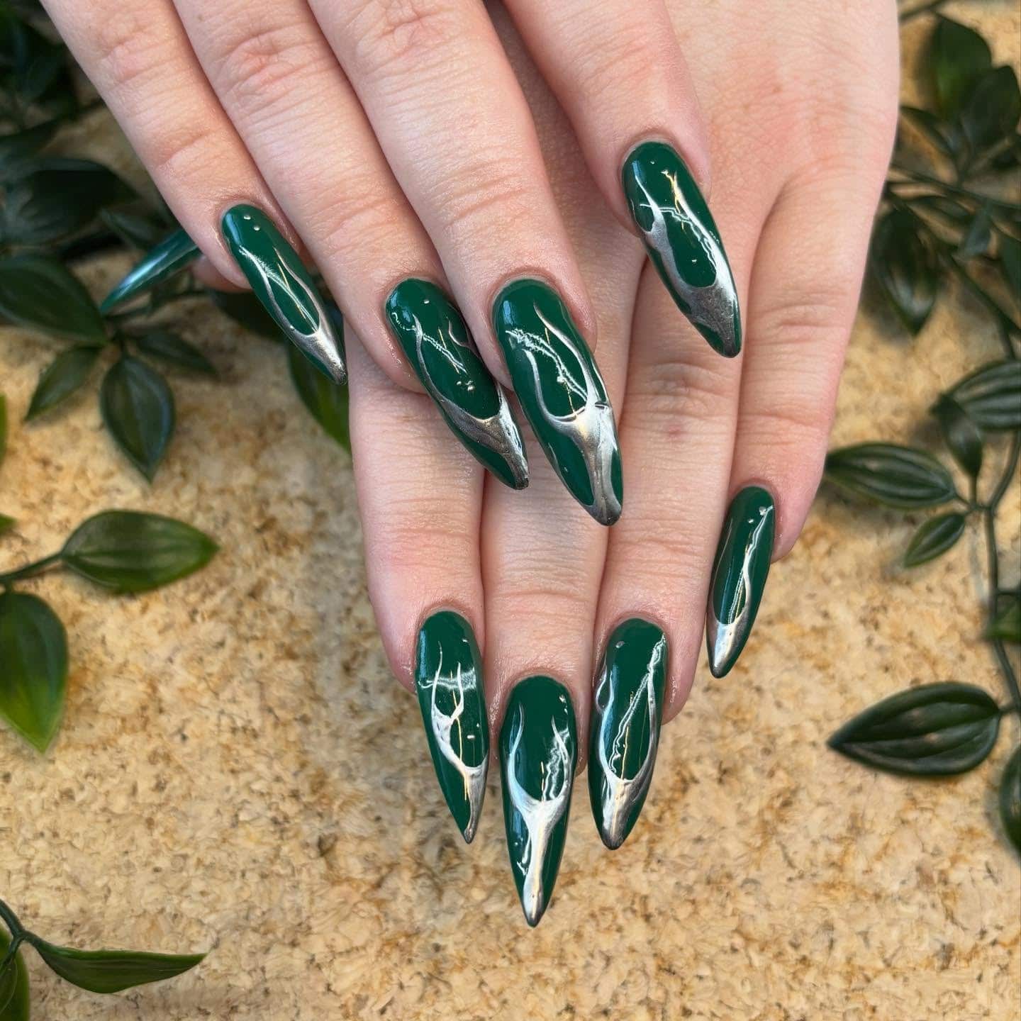 6. Deep Forest Green Chrome Flame Nails - green nail ideas