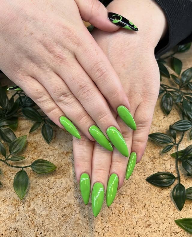 9. Bright Lime Green Stiletto Nails - green nail ideas