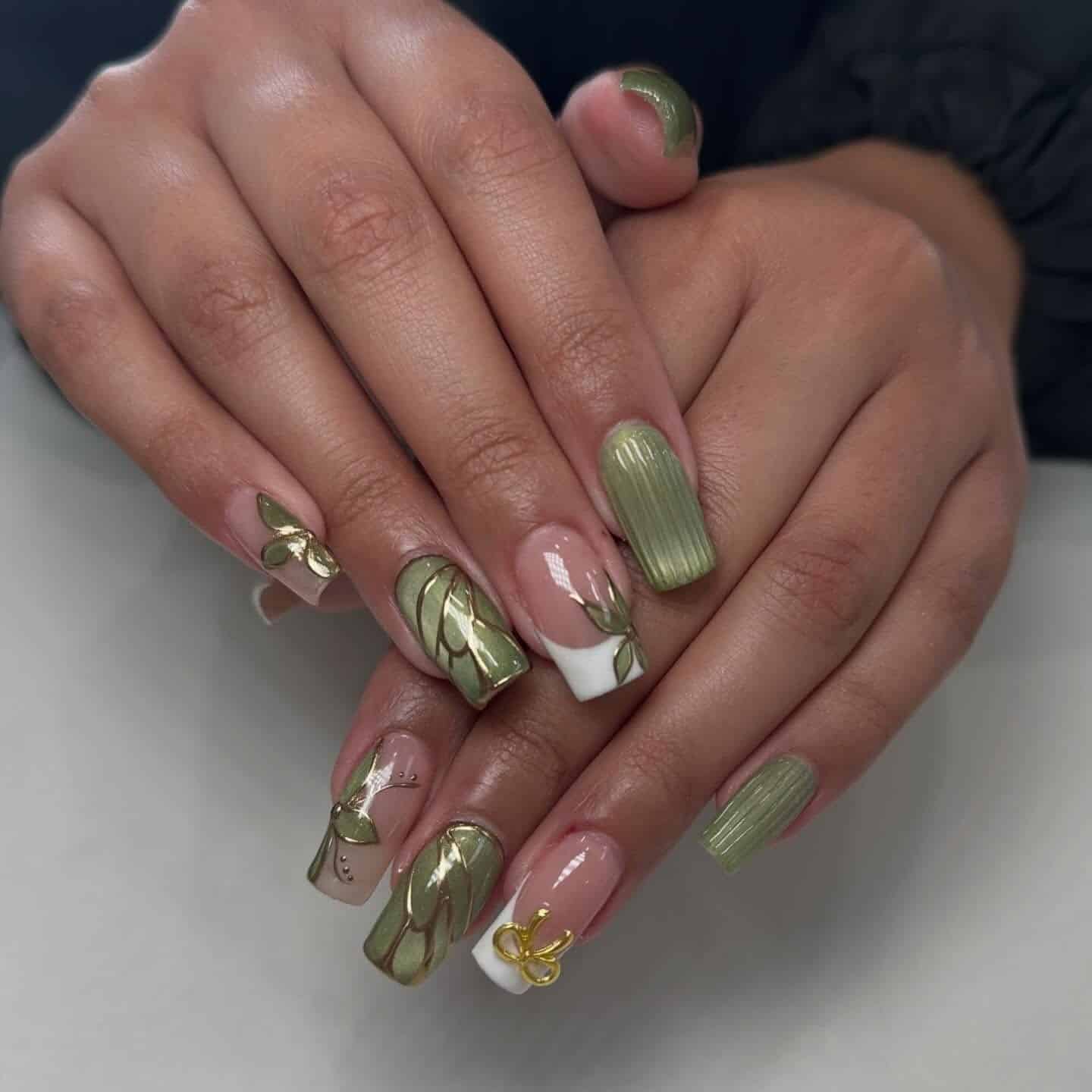 16. Olive Green Botanical Acrylic Nails - green nail ideas
