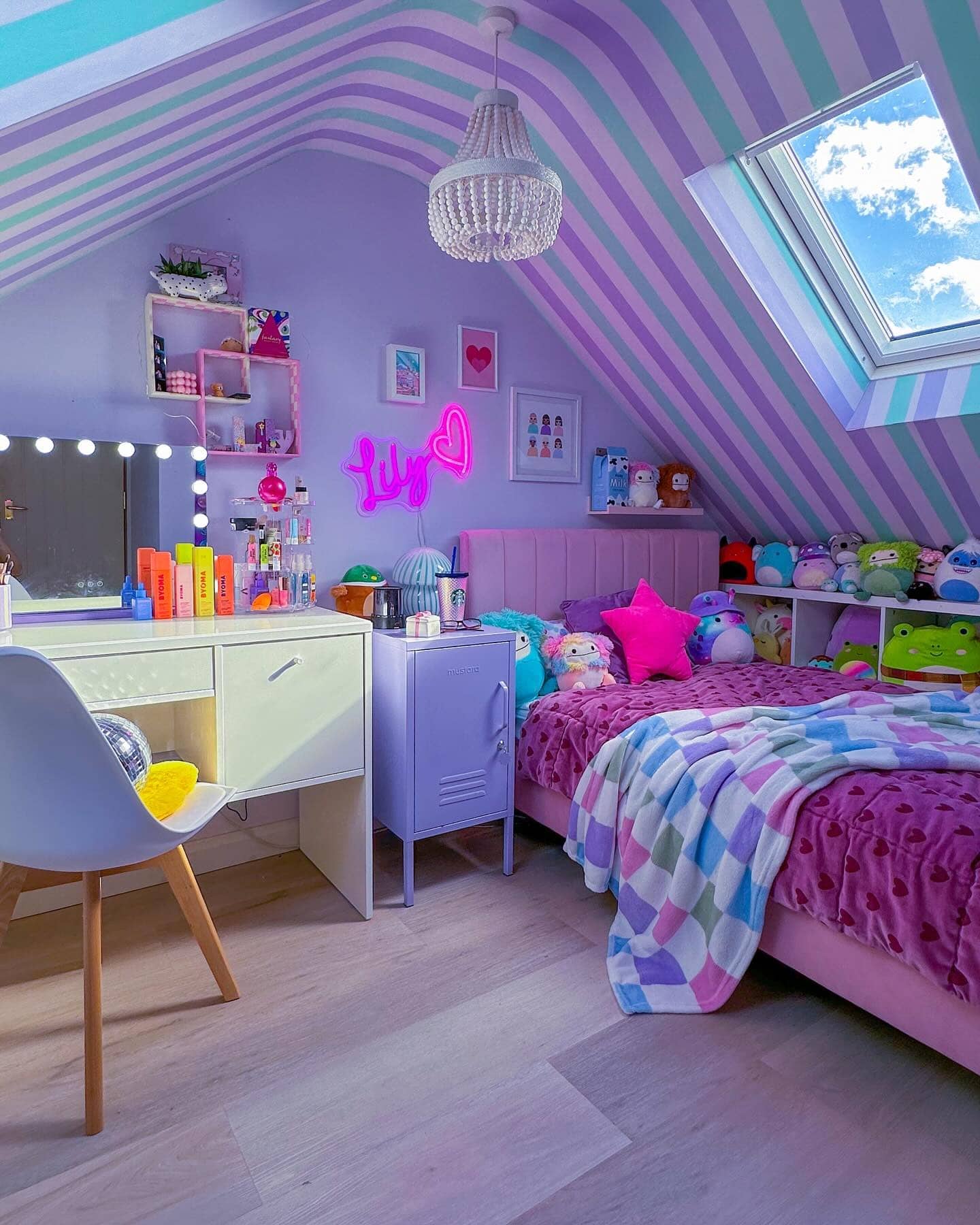 7. Pastel Purple Attic Bedroom With Neon Decor - purple bedroom ideas