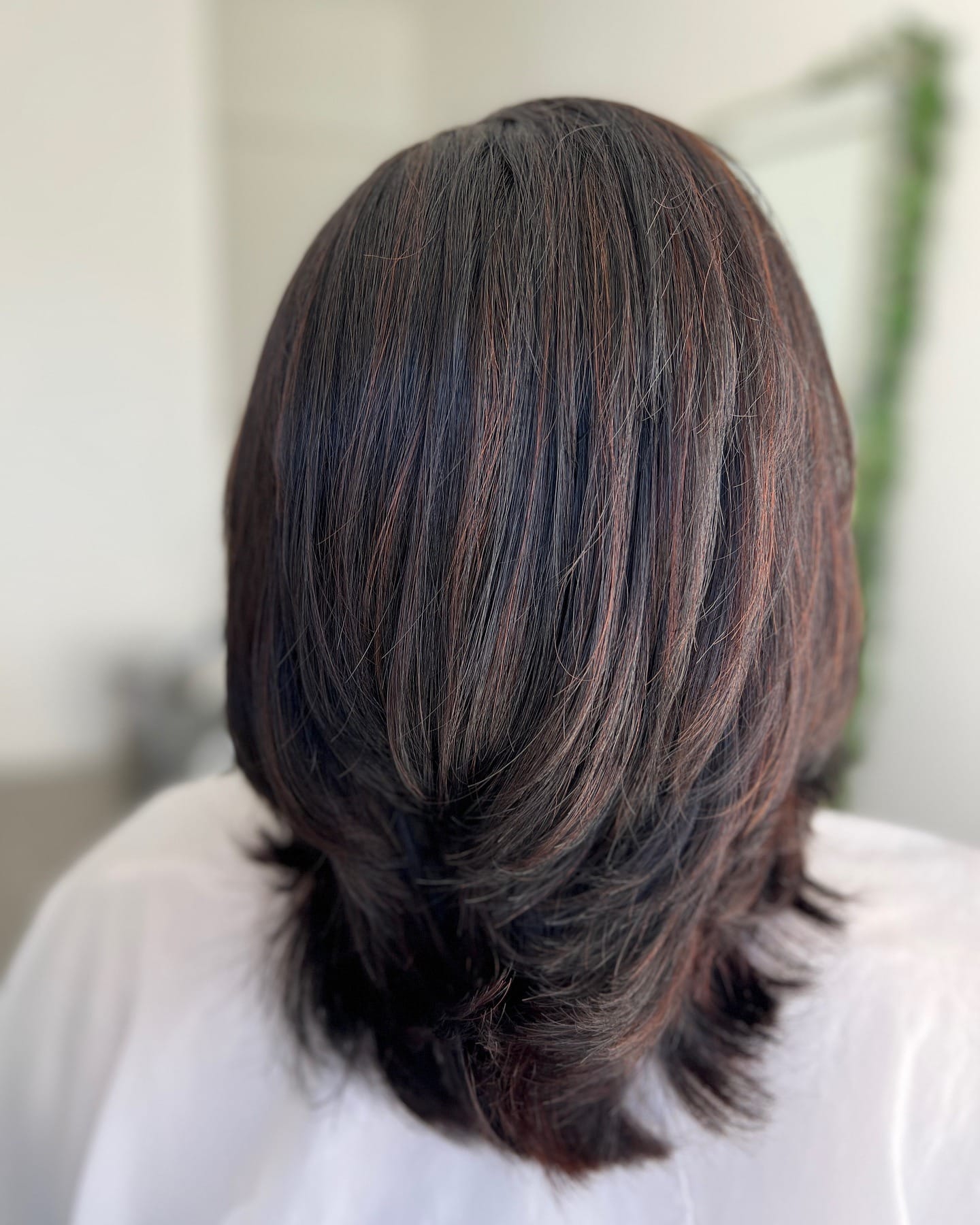 13. Layered Feather Lob with Cinnamon Highlights - Feather Haircuts For Women