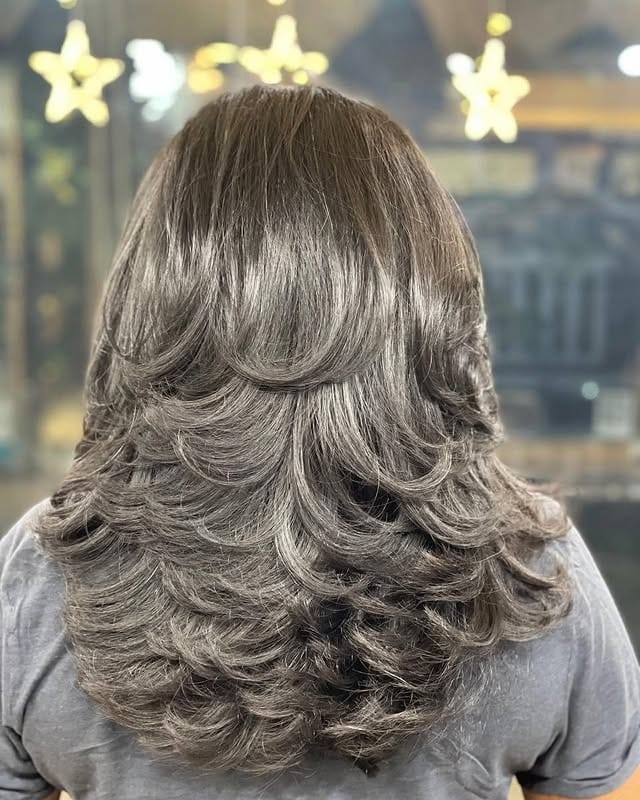 20. Voluminous Feather Layers in Smoky Ash Brown - Feather Haircuts For Women