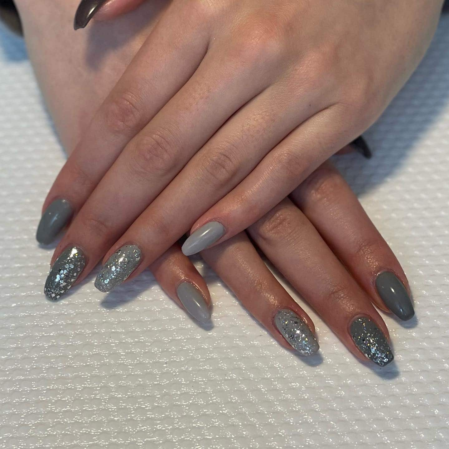 10. Grey Almond Glitter Nails - grey coffin nail ideas