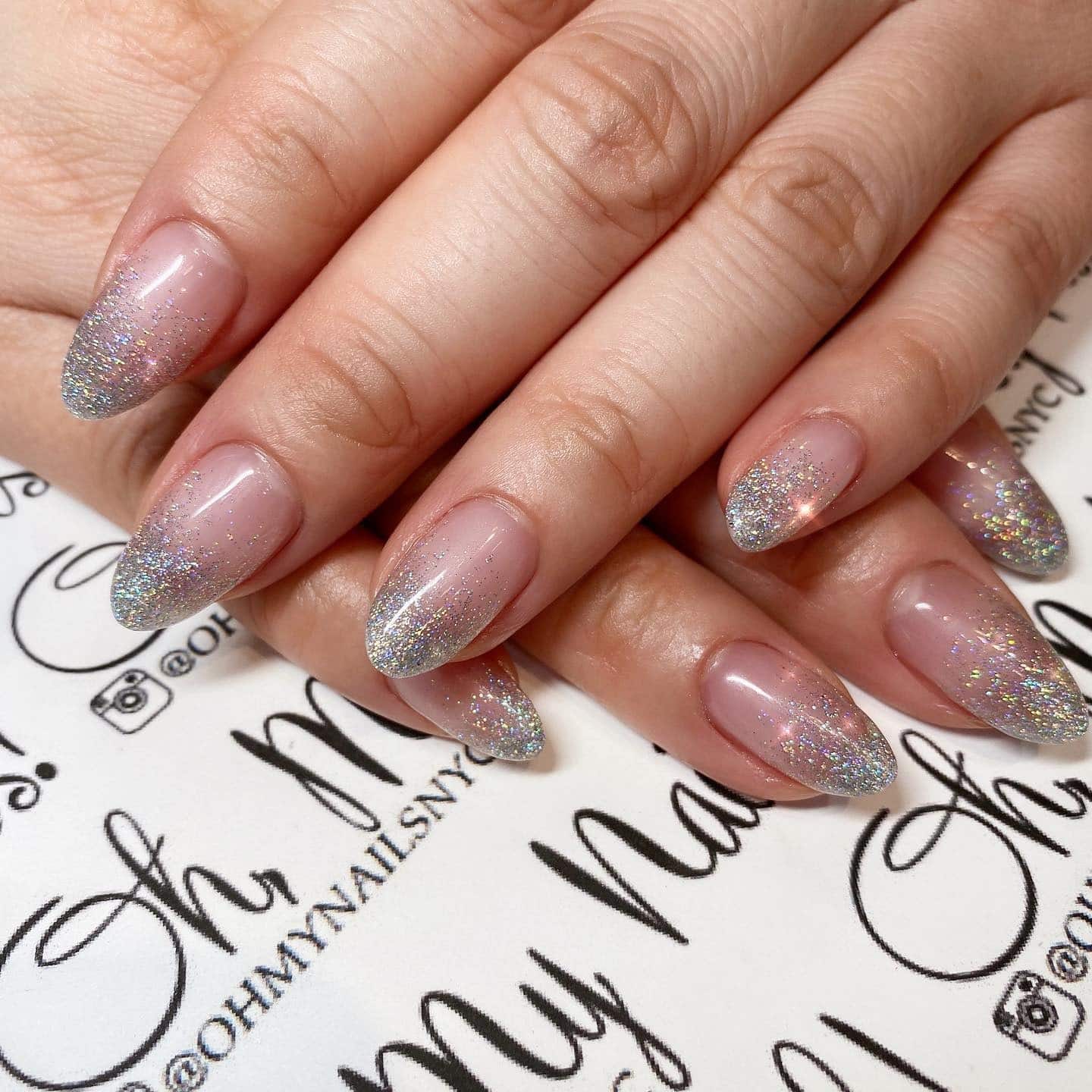 2. Silver Glitter Ombre Almond Nails - glitter sparkle nail ideas
