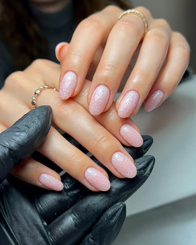 5. Soft Pink Shimmer Almond Nails - glitter sparkle nail ideas