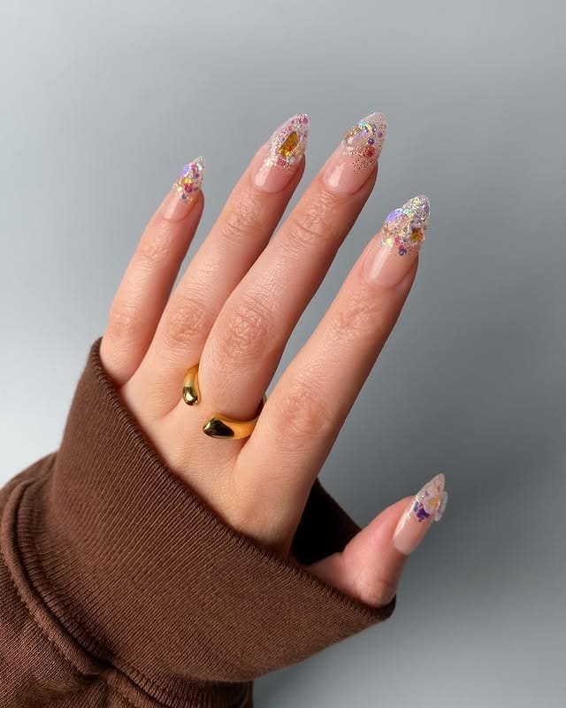 10. Crystal Glitter Stiletto Nails - glitter sparkle nail ideas