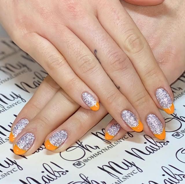 12. Orange French Tip Glitter Nails - glitter sparkle nail ideas