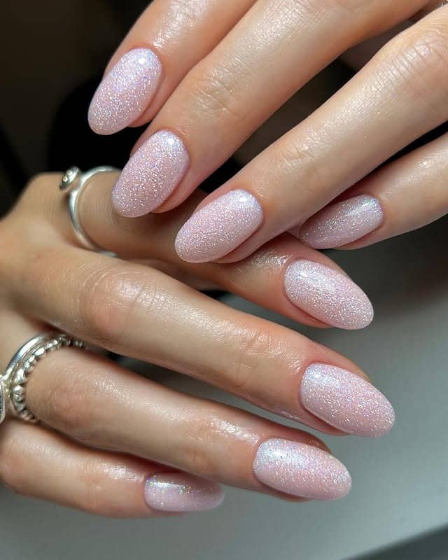 14. Icy Pink Shimmer Almond Nails - glitter sparkle nail ideas