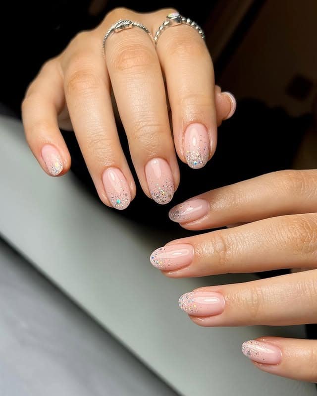 17. Sheer Nude Glitter Tip Nails - glitter sparkle nail ideas