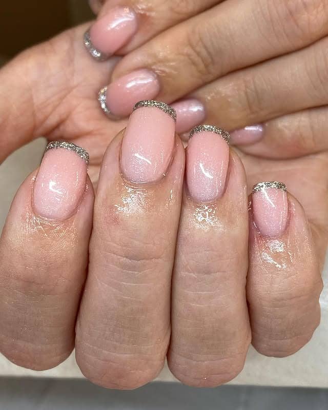 20. Soft Pink Glitter French Nails - glitter sparkle nail ideas