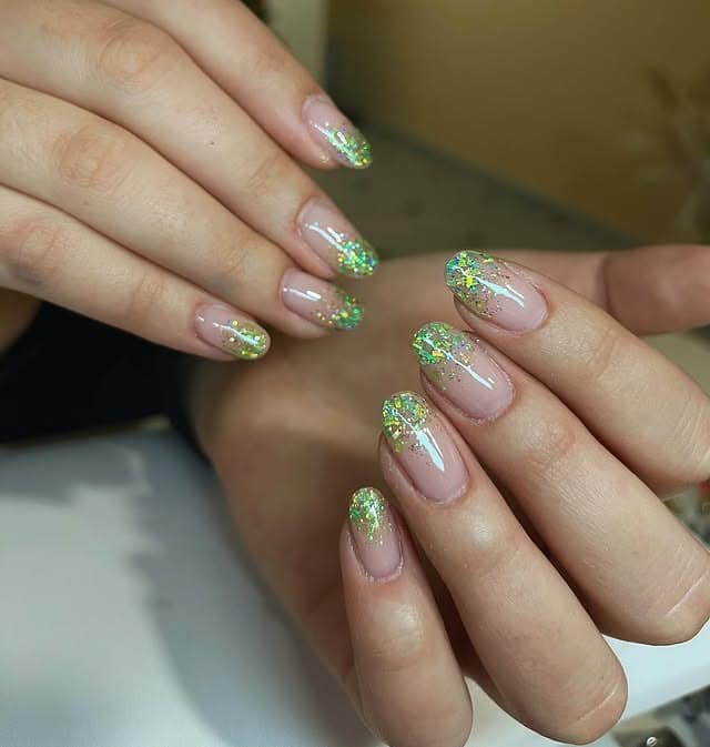 22. Lime Green Glitter Fade Almond Nails - glitter sparkle nail ideas