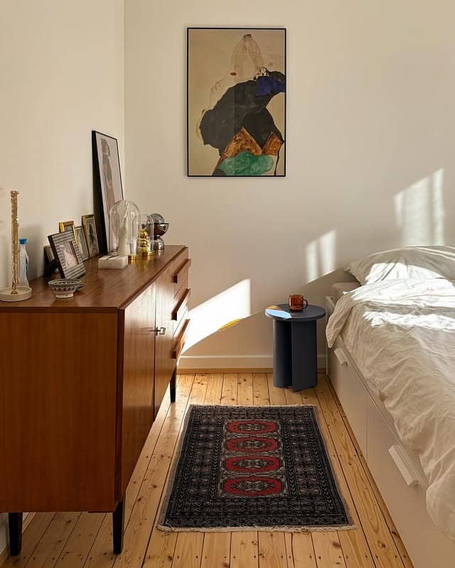 6. Midcentury Vintage Bedroom with Warm Wood Tones - vintage bedroom ideas