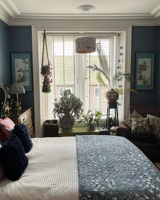 8. Vintage Blue Bedroom with Bay Window Styling - vintage bedroom ideas
