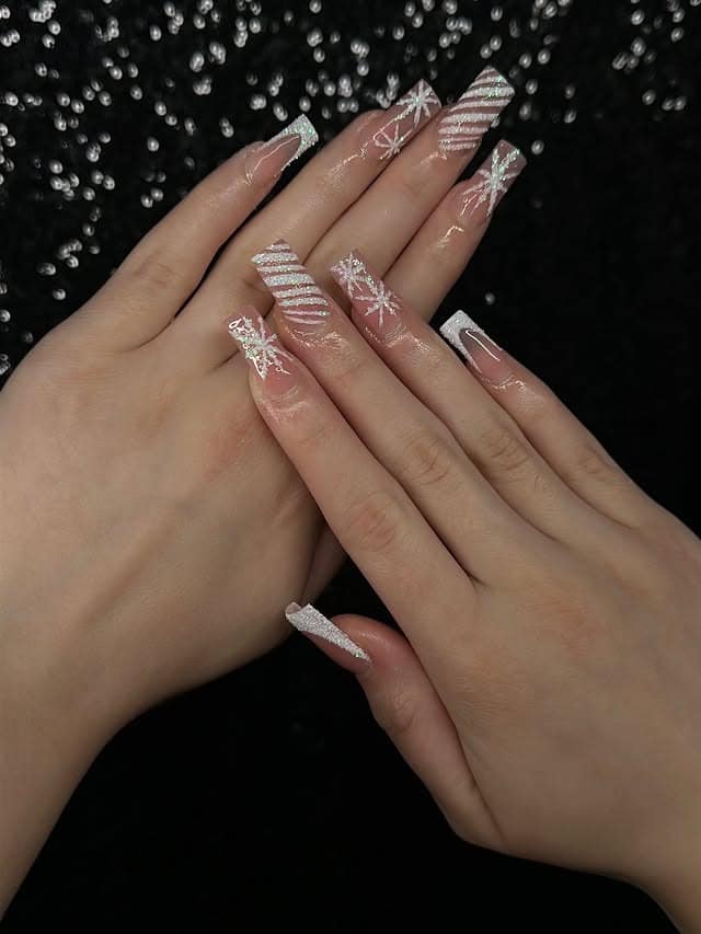 6. Pink Glitter Snowflake Coffin Nails - winter nail ideas