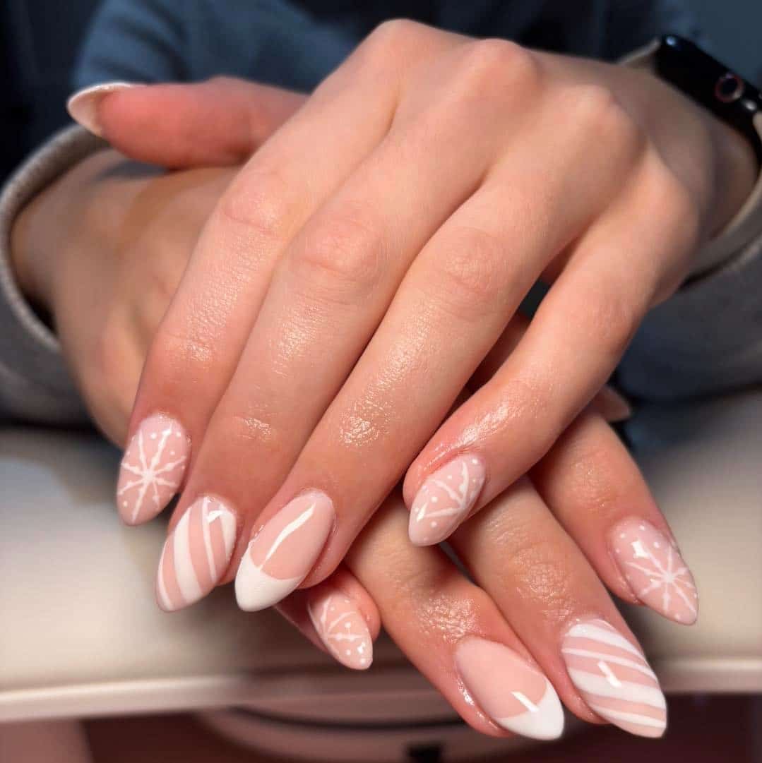 8. Pale Pink Candy Cane Almond Nails - winter nail ideas