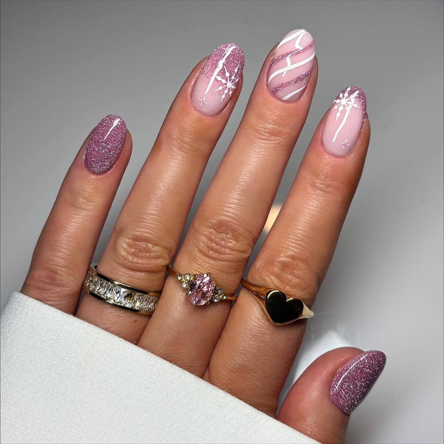 9. Rose Pink Glitter Accent Nails - winter nail ideas