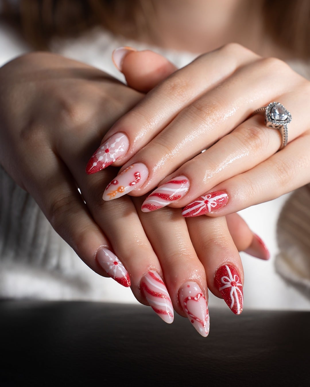 14. Candy Cane Red Glitter Almond Nails - winter nail ideas
