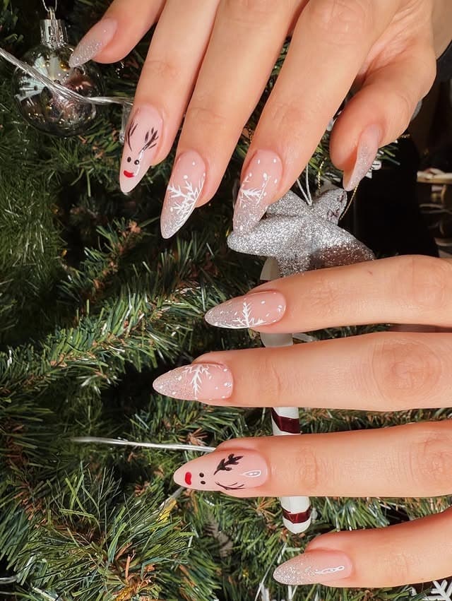 15. Silver Reindeer Winter Almond Nails - winter nail ideas