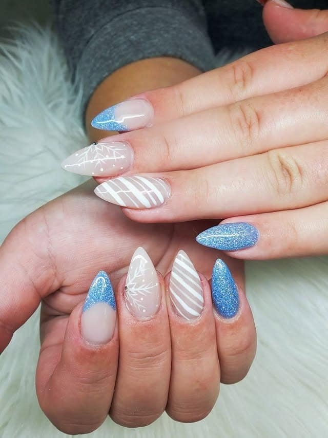 16. Icy Blue Glitter Almond Nails - winter nail ideas