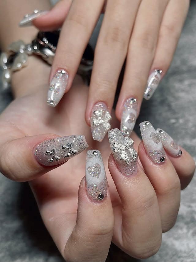 17. Crystal Silver 3D Winter Coffin Nails - winter nail ideas