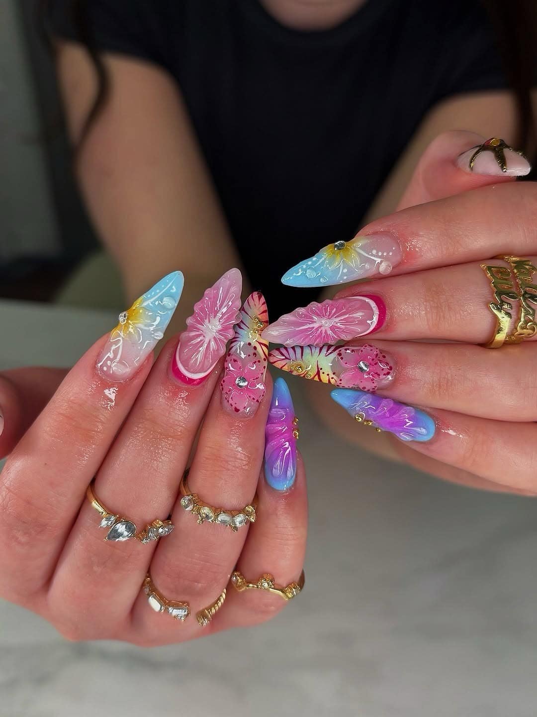 10. Pastel Butterfly Stiletto Nails with Tropical Florals - nail ideas for work