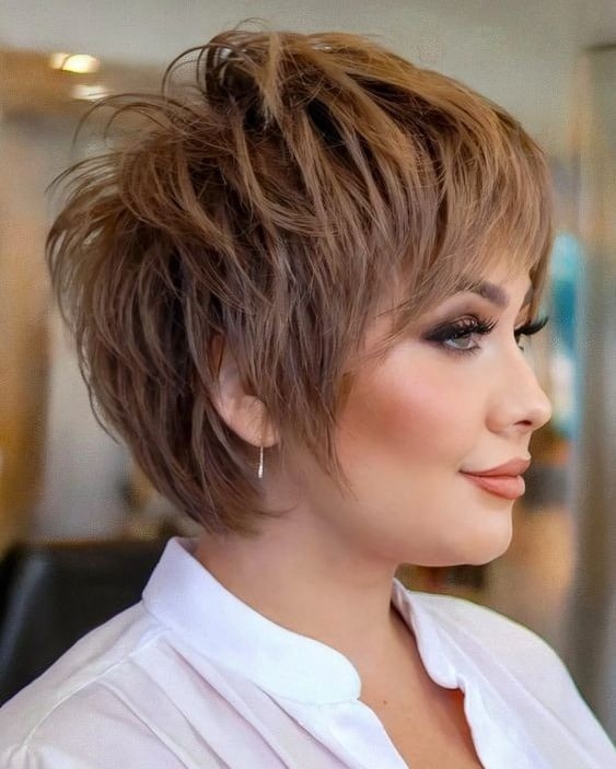 2. Textured Brunette Pixie Bob with Feathered Bangs - Pixie Hairstyles With Bangs