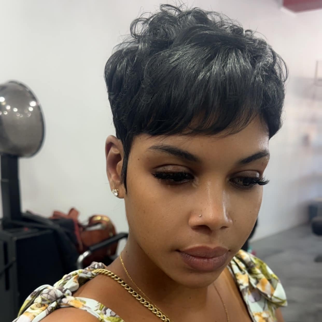 4. Sleek Espresso Pixie Cut with Wispy Bangs - Pixie Hairstyles With Bangs
