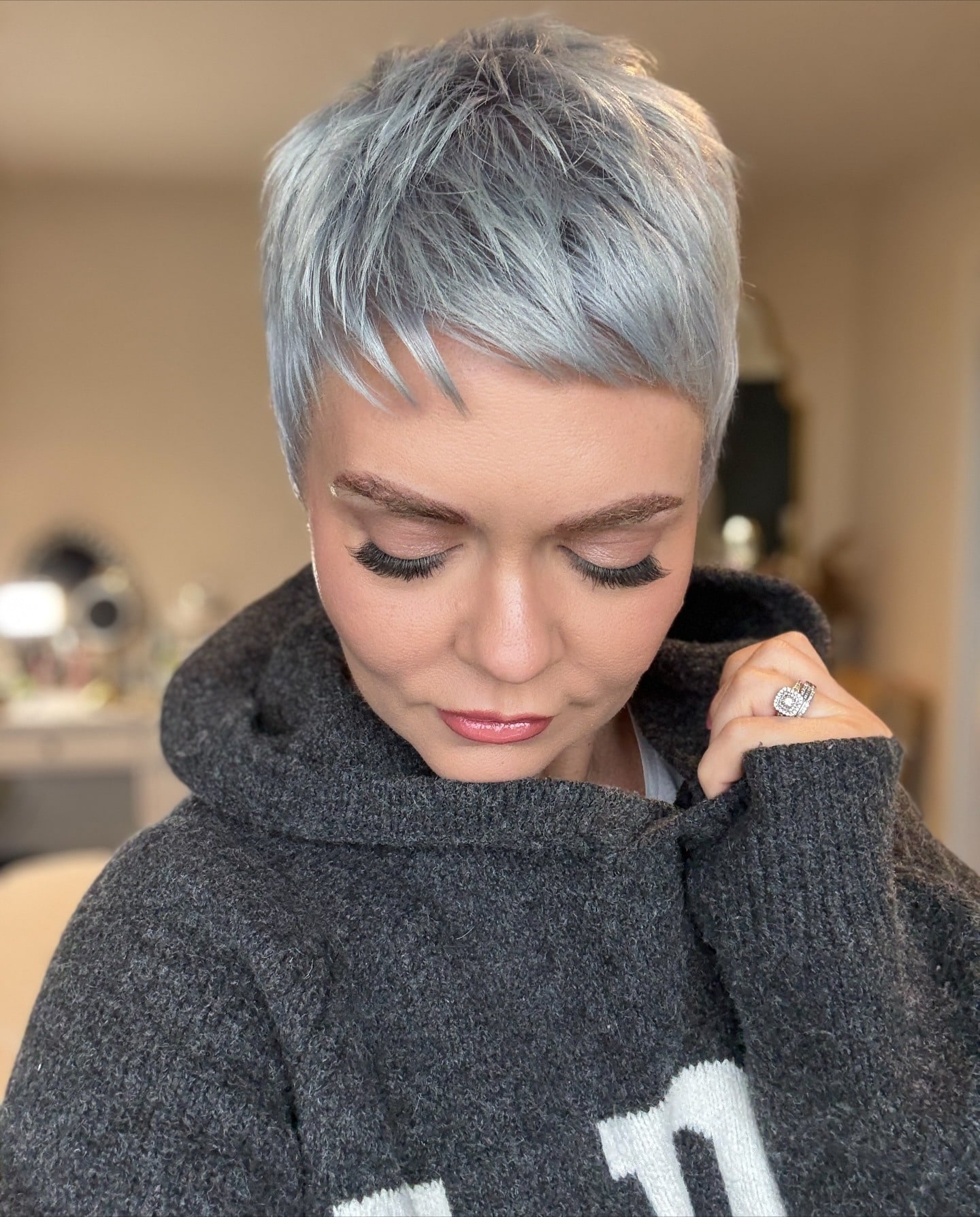 7. Silver Frost Pixie with Piecey Bangs - Pixie Hairstyles With Bangs